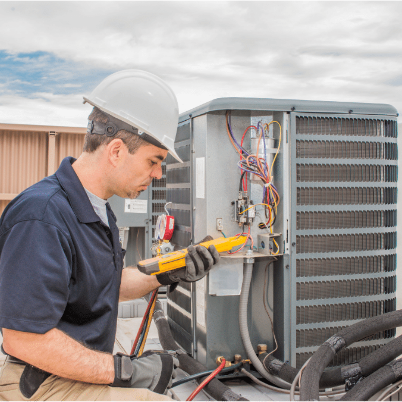 Owen Sound Heating & Cooling HVAC technician on a service call in Owen Sound, Ontario
